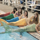 Illustration for article titled Live out your mermaid dreams with these swimmable tails